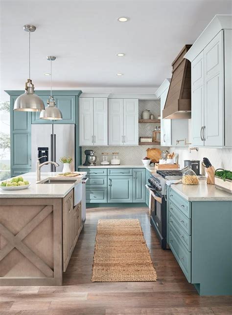 farmhouse kitchen with blue cabinets.